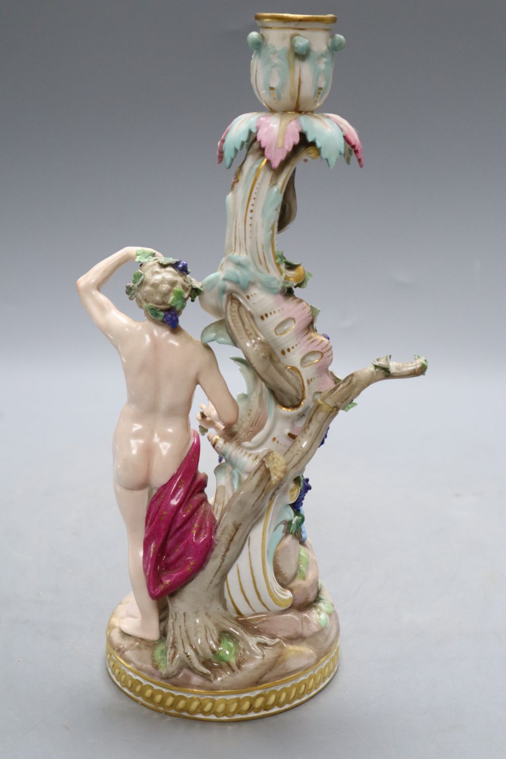 A Meissen Bacchus and cherub candelabrum, 19th century, H. 29cm